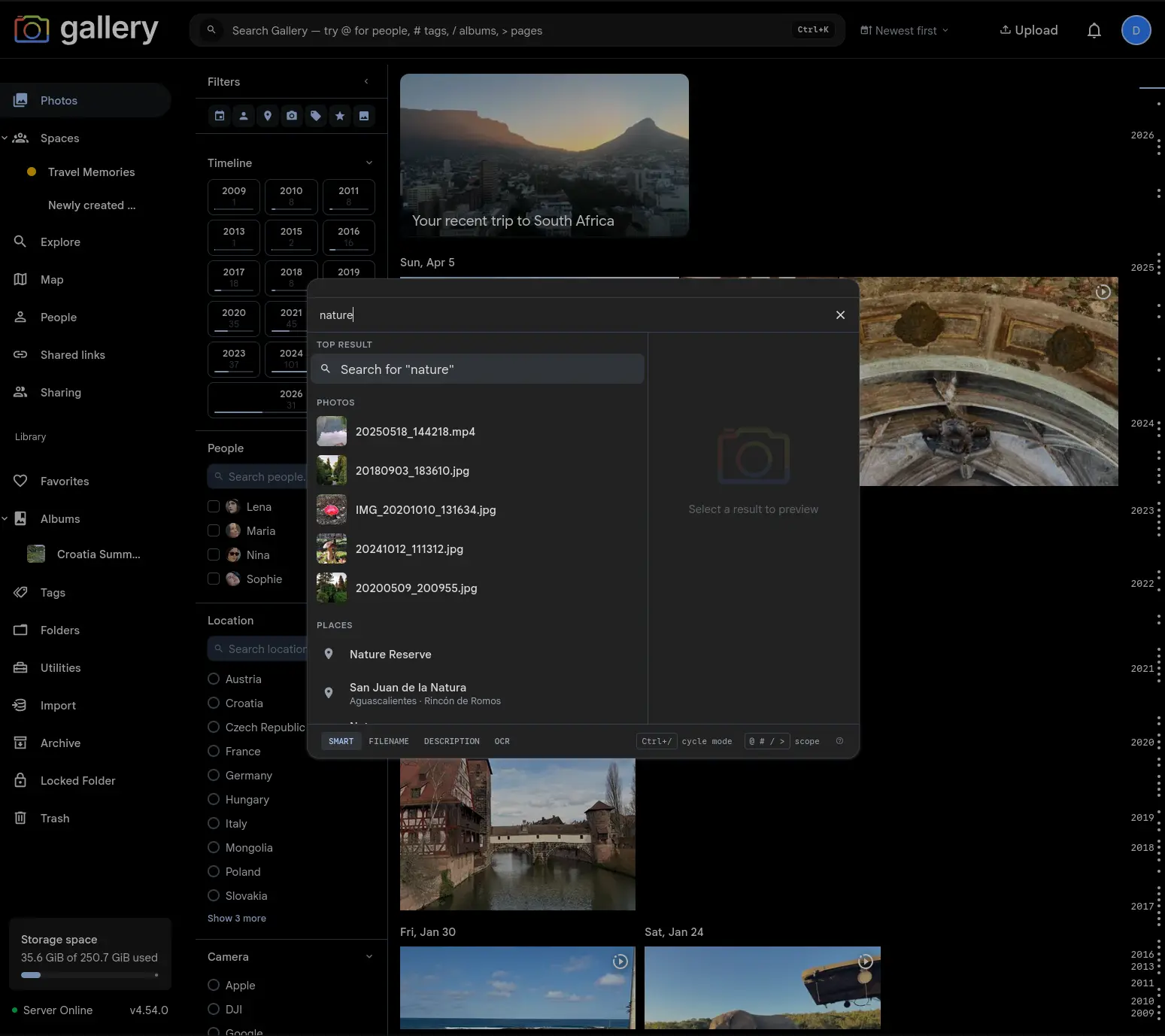 Gallery Photos page with the Cmd+K search palette open for 'nature', showing a Top result, photo results, place results, and the timeline search and sort controls in the navbar