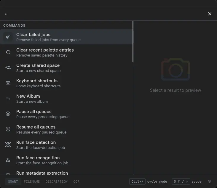 Gallery's Cmd+K search palette with '>' typed into the input, showing the bare-prefix command index with commands like 'Clear failed jobs', 'Create shared space', and 'Keyboard shortcuts', plus the @ # / > scope hint in the footer